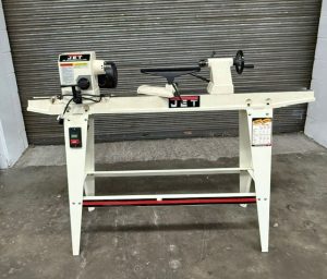 Used Jet JWL-1236 12" x 36" wood lathe with stand and misc turning tools & chucks