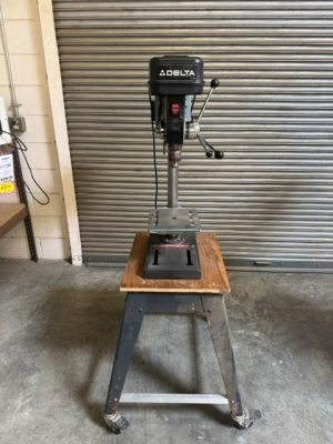Used Delta 11-990 radial drill press 1/3 hp with Delta stand and link belt
