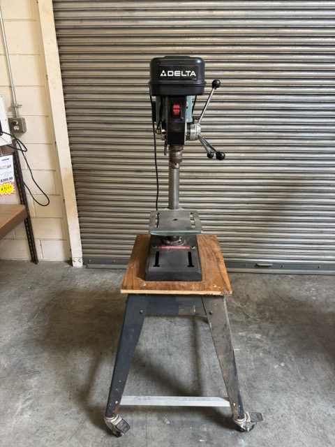 Used Delta 11-990 radial drill press 1/3 hp with Delta stand and link belt