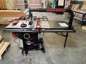 Used SawStop 3hp Professional Saw package with 36" T-glide fence, industrial mobile base, floating dust collection & folding outfeed table