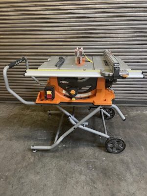"Used " Ridgid R45101 10" jobsite tablesaw 15 amp with 25" rip fence includes folding mobile stand