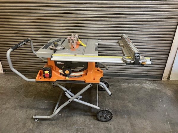 "Used " Ridgid R45101 10" jobsite tablesaw 15 amp with 25" rip fence includes folding mobile stand - Image 8