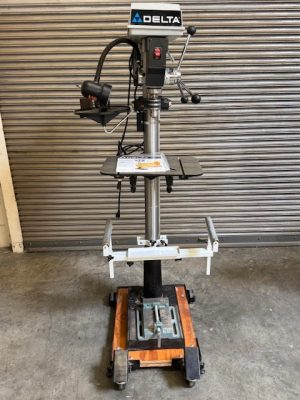 Used Delta 17-950L 17" drill press with mobile base, extensions, tool tray, laser and vise