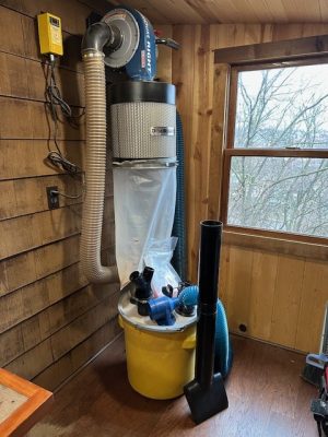 Used Rockler 1250 CFM Dust Right wall mount dust collector with canister filter and dust seperator