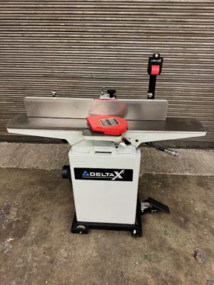 Used Delta X5 6" jointer with mobile base and extra knives
